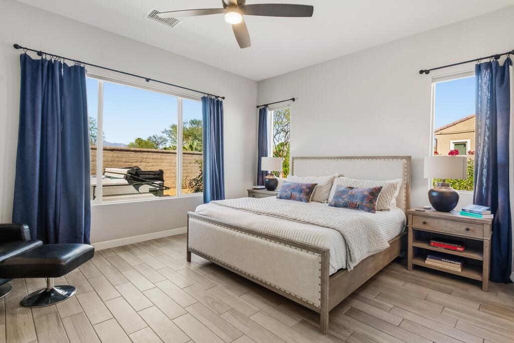 77 Barolo Rancho Mirage, CA 92270 - Photo 6 of 61 a bedroom with a bed and a large window