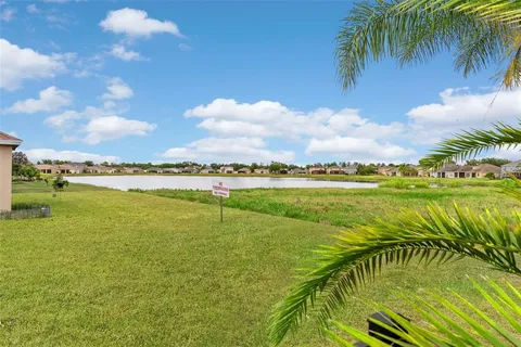 an aerial view of residential building and lake view