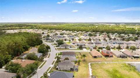 an aerial view of a house with garden