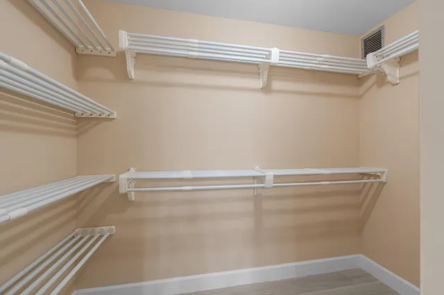 a view of a room with racks on the wall