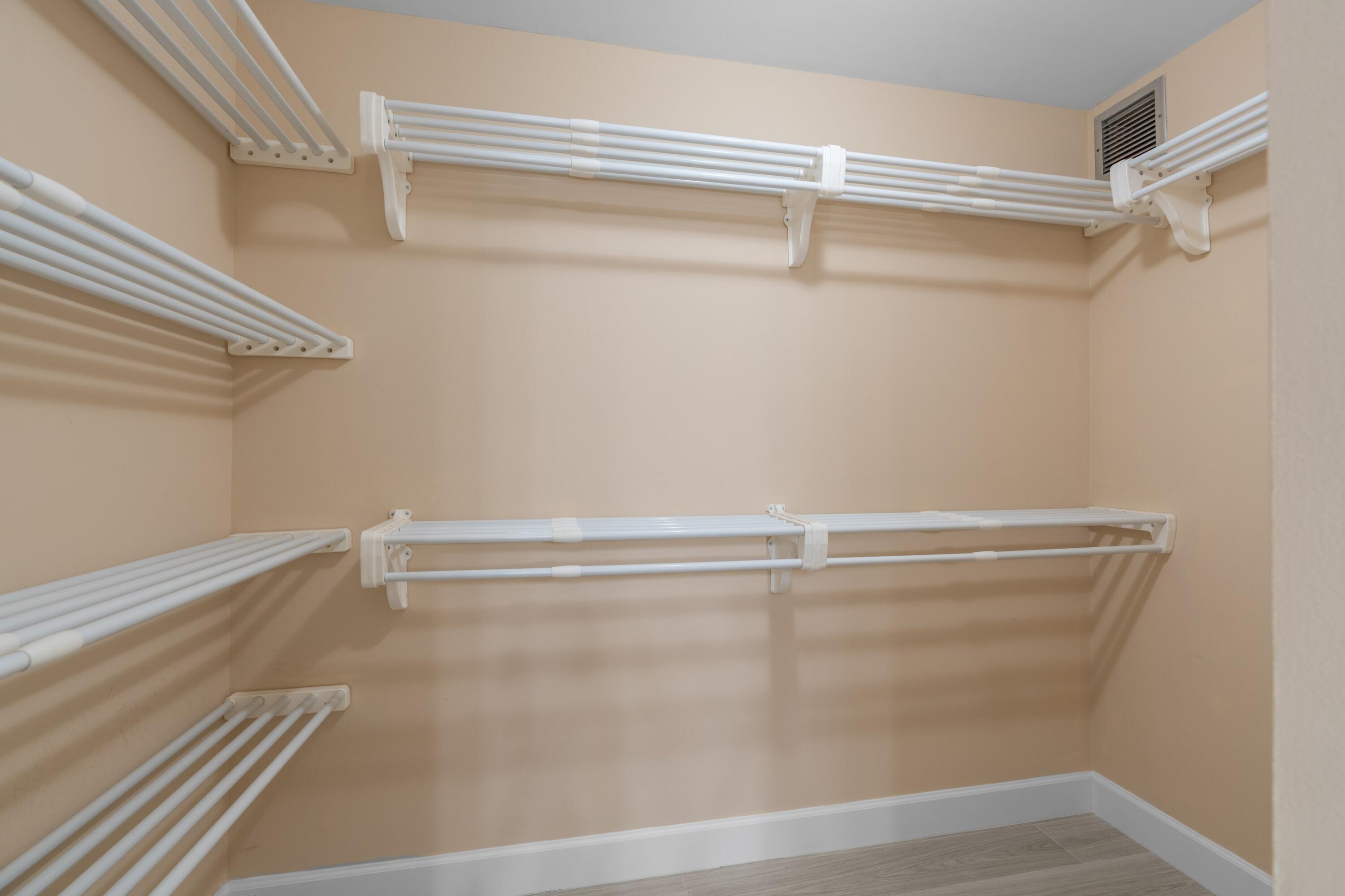 6025 Balboa Circle, Unit 406 Boca Raton, FL 33433 - Photo 11 of 33 a view of a room with racks on the wall