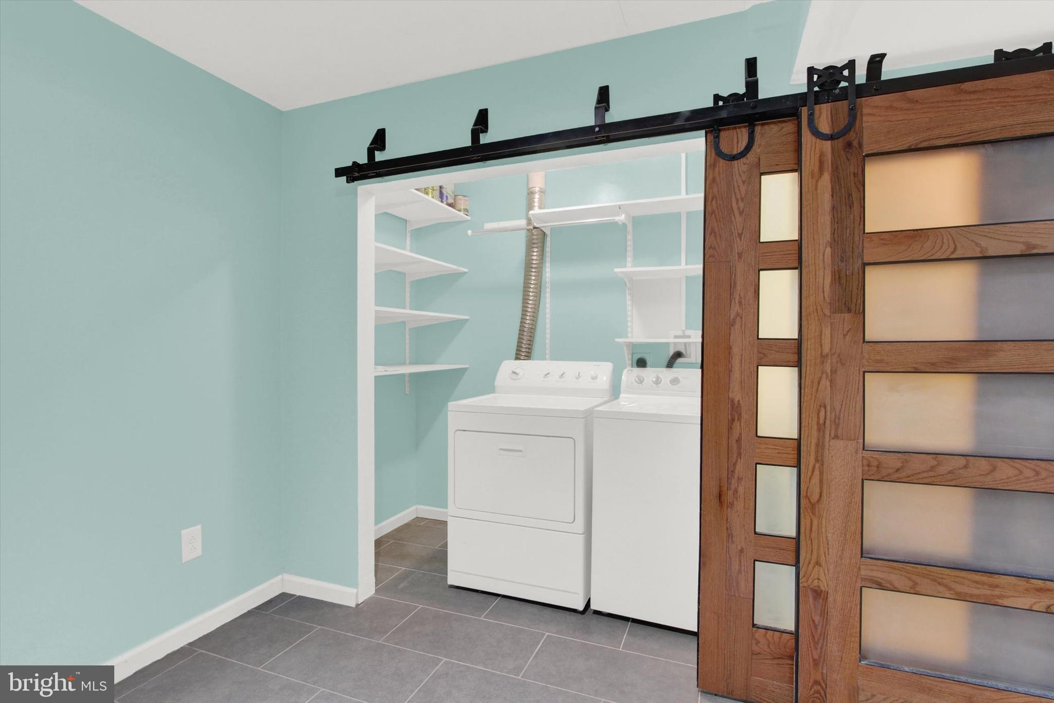2426 Schultz Way York, PA 17402 - Photo 8 of 32 Modern Sliders conceal laundry and utilities