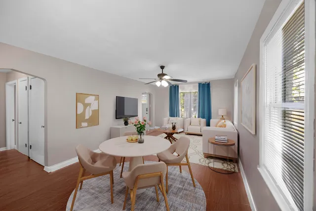 a view of a livingroom with furniture and window