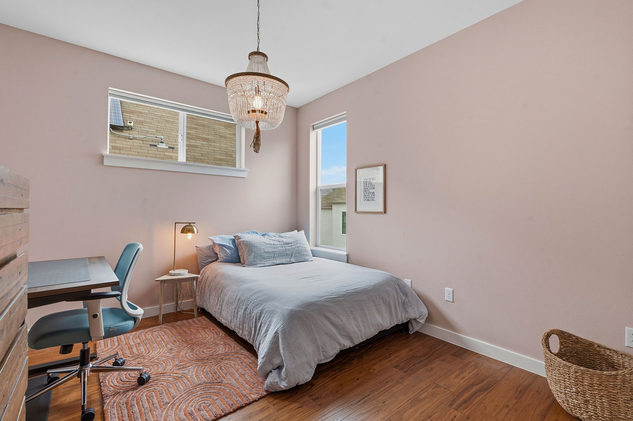 3001 Del Curto Road, Unit 31 Austin, TX 78704 - Photo 23 of 32 a bedroom with a bed and a chair