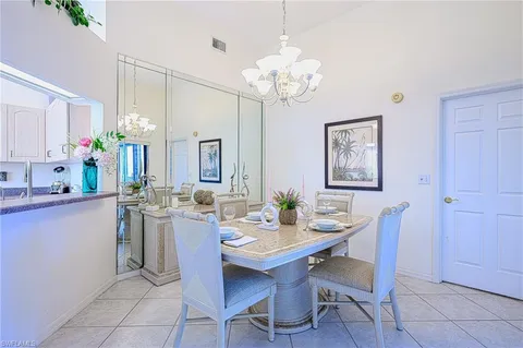 a kitchen with stainless steel appliances granite countertop a refrigerator sink and cabinets