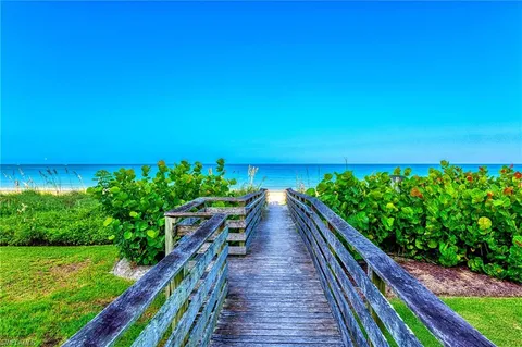 $558,000 | 613 Beachwalk Circle, Unit J203, Naples, FL 34108