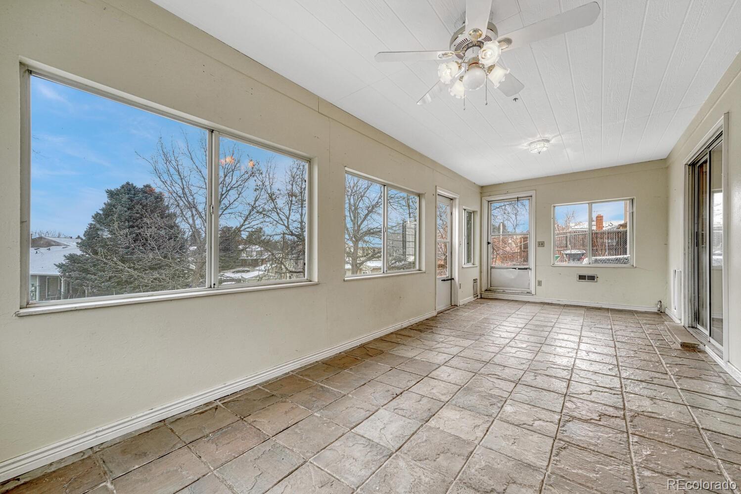 2079 South Quintero Street Aurora, CO 80013 - Photo 19 of 35 a view of an empty room with a window