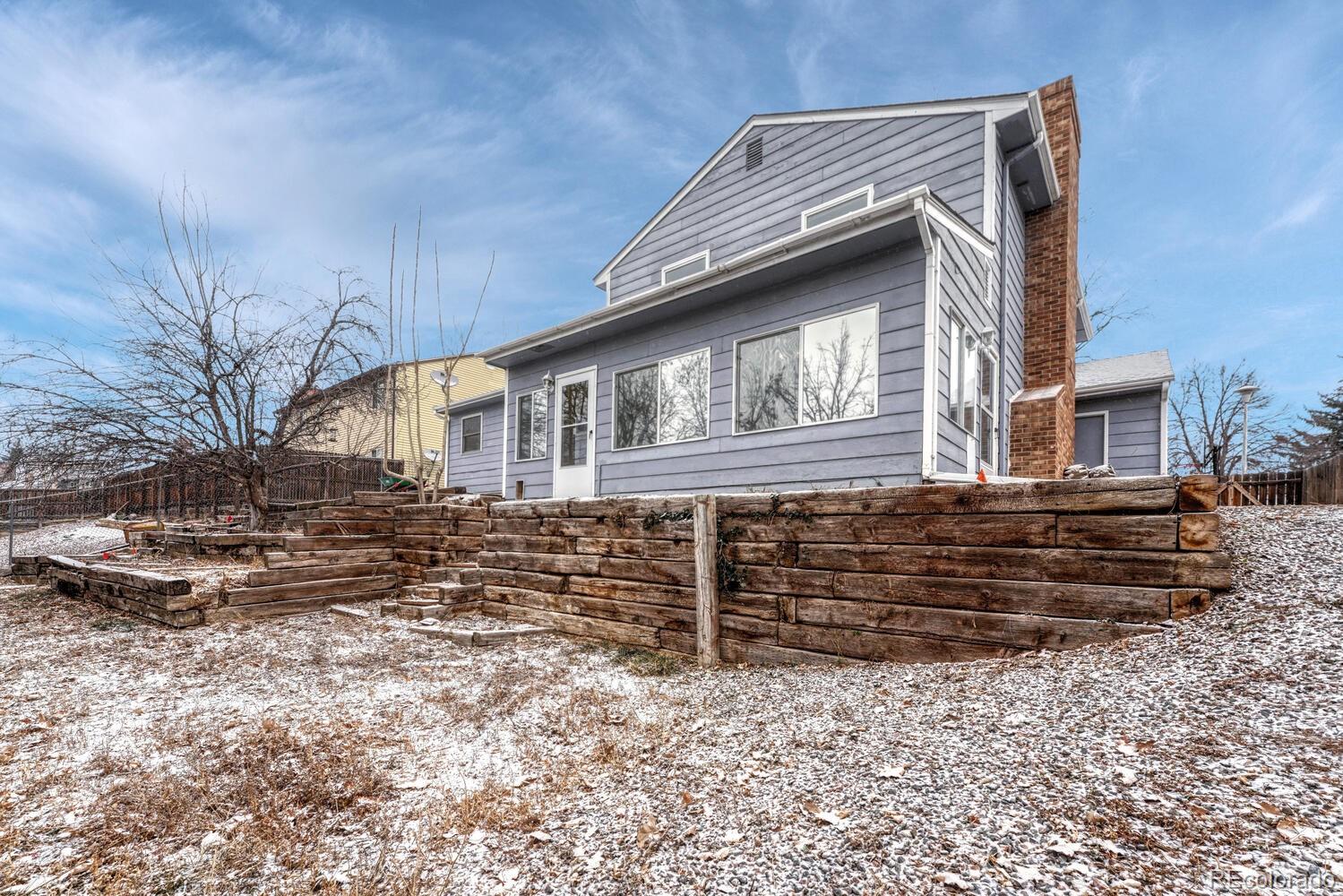 2079 South Quintero Street Aurora, CO 80013 - Photo 36 of 37 a front view of a house with stairs