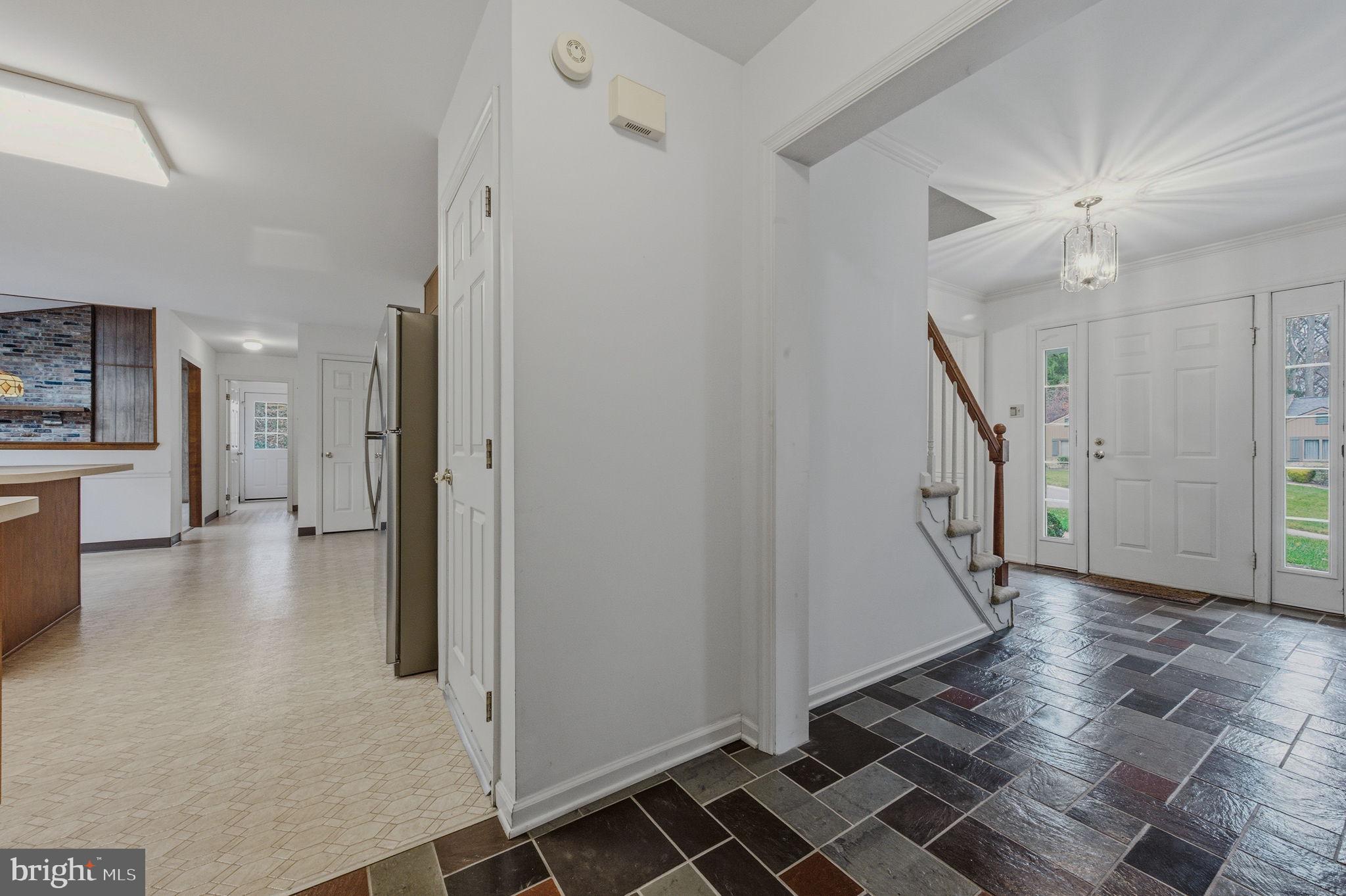 23 Raphael Road Hockessin, DE 19707 - Photo 13 of 44 a view of a hallway view with staircase