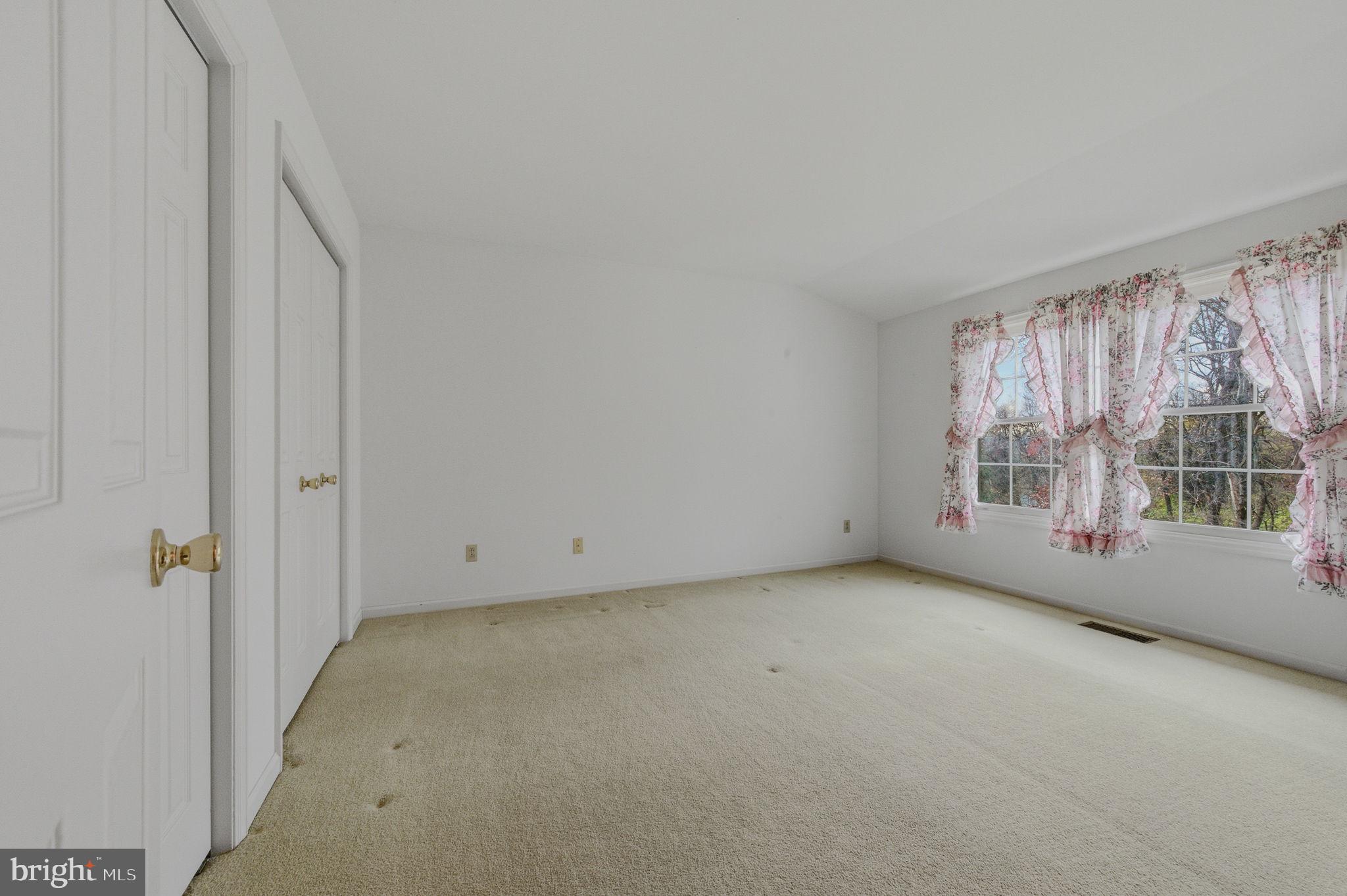 23 Raphael Road Hockessin, DE 19707 - Photo 30 of 44 an empty room with windows