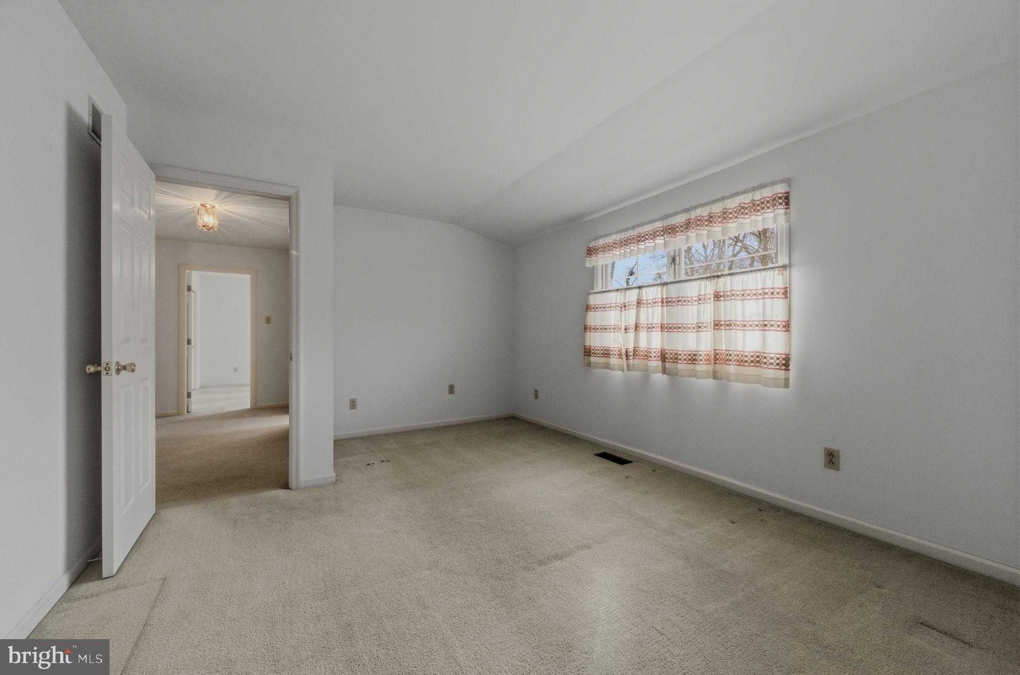 23 Raphael Road Hockessin, DE 19707 - Photo 34 of 44 an empty room with windows