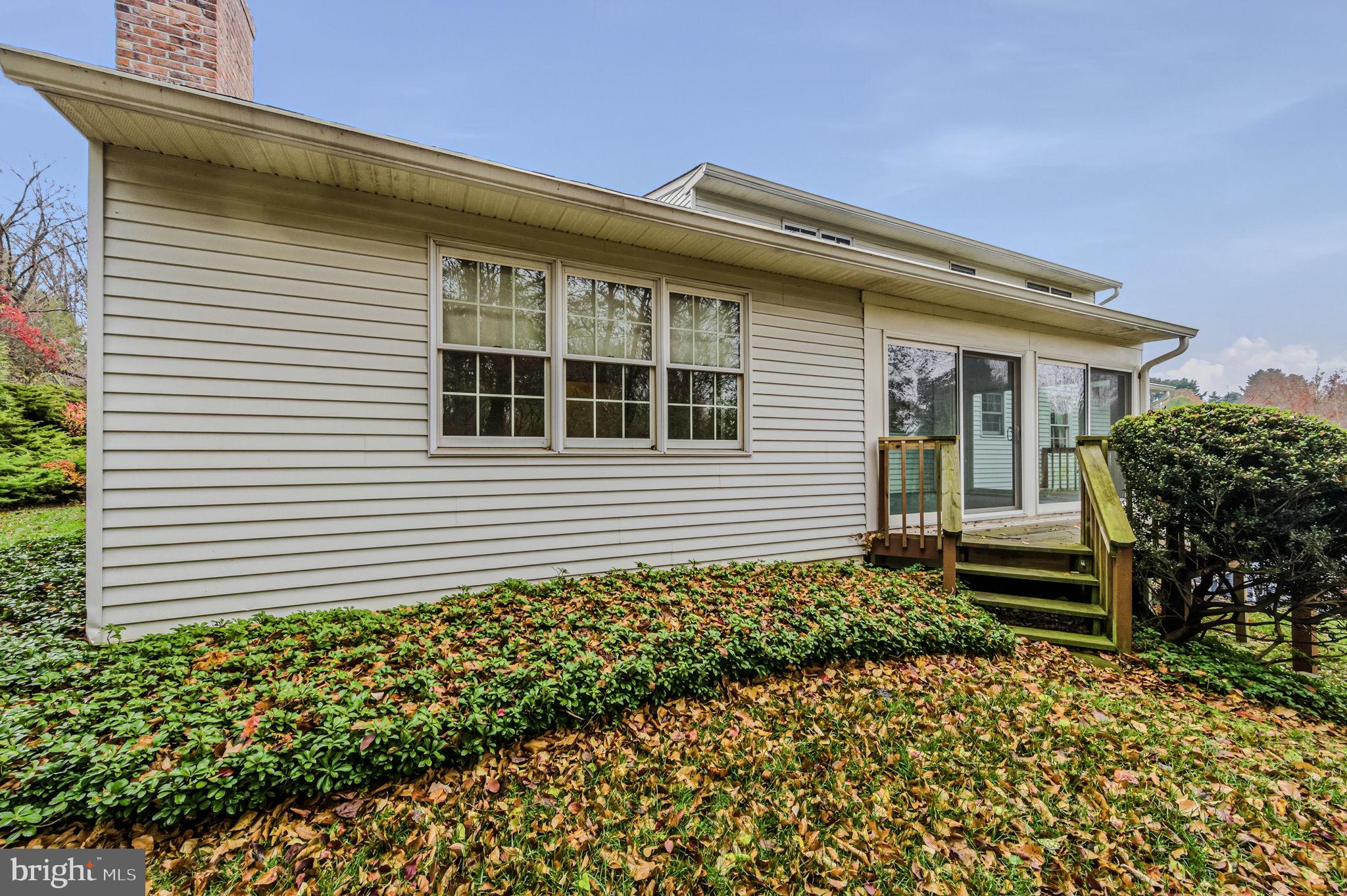 23 Raphael Road Hockessin, DE 19707 - Photo 40 of 44 a front view of a house with garden