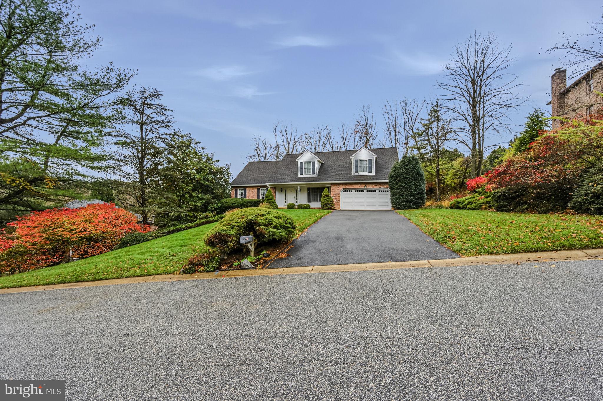 23 Raphael Road Hockessin, DE 19707 - Photo 4 of 44 a view of a street with a houses