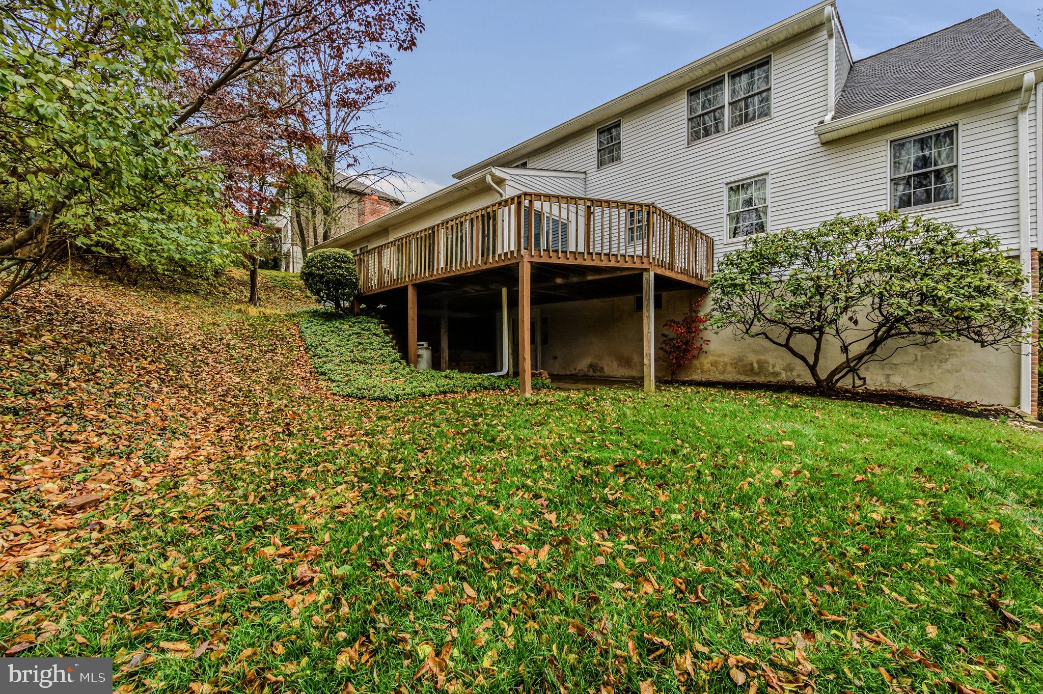 23 Raphael Road Hockessin, DE 19707 - Photo 44 of 44 front view of a house with a yard