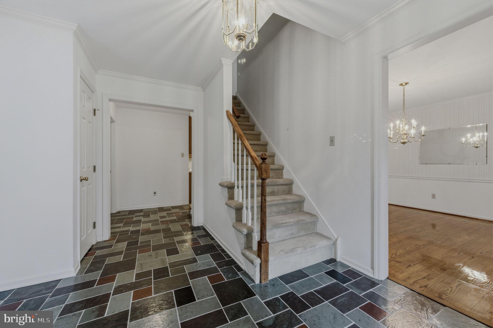 23 Raphael Road Hockessin, DE 19707 - Photo 6 of 44 a view of a bathroom with a black and white checkered floor