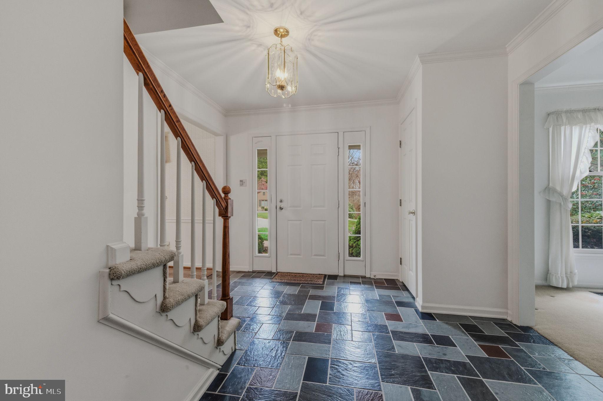23 Raphael Road Hockessin, DE 19707 - Photo 7 of 44 a view of entryway with a front door