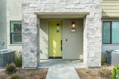 a front view of a house with a shower