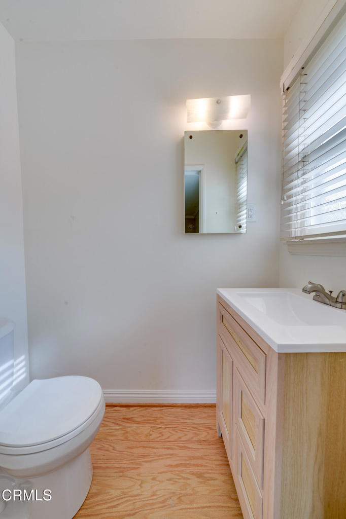 1360 Blackstone Road San Marino, CA 91108 - Photo 12 of 31 a bathroom with a sink a toilet and mirror
