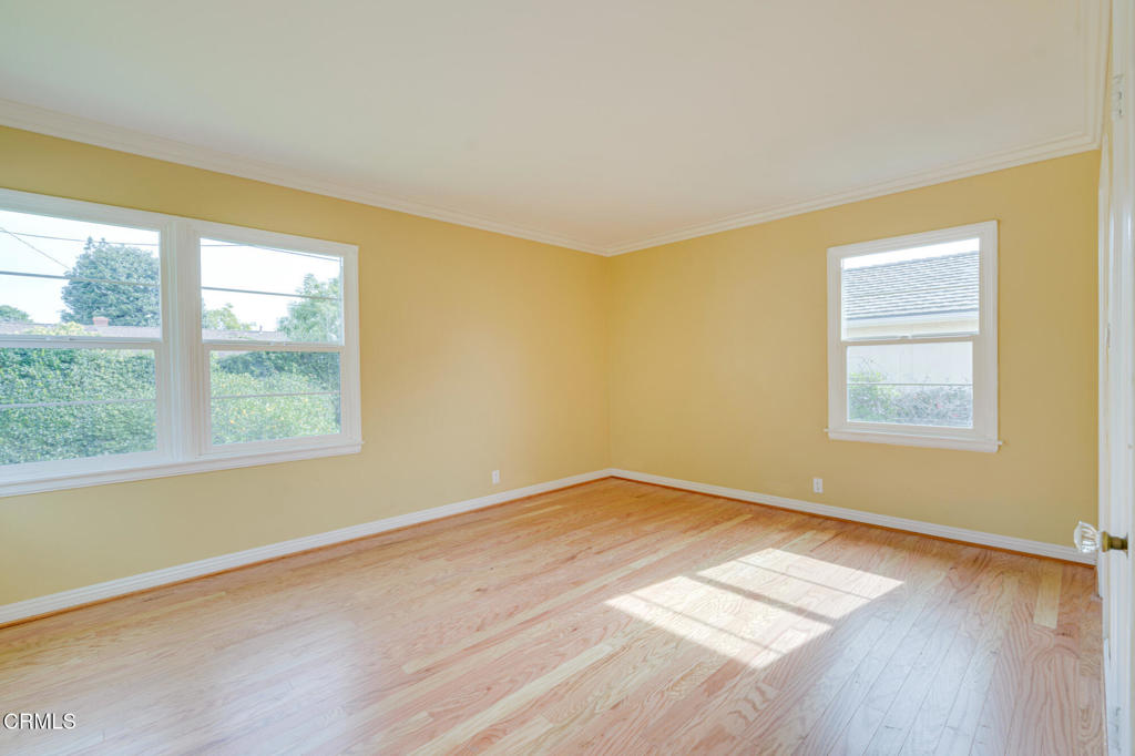 1360 Blackstone Road San Marino, CA 91108 - Photo 21 of 31 a view of an empty room with wooden floor and a window