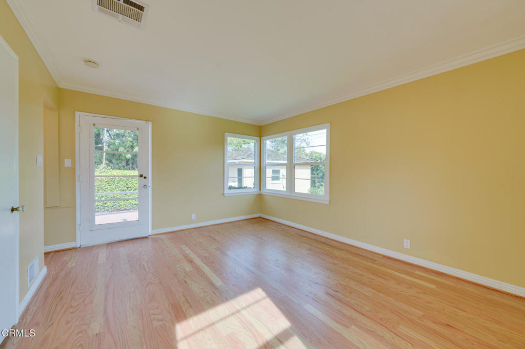 1360 Blackstone Road San Marino, CA 91108 - Photo 24 of 31 an empty room with wooden floor and windows