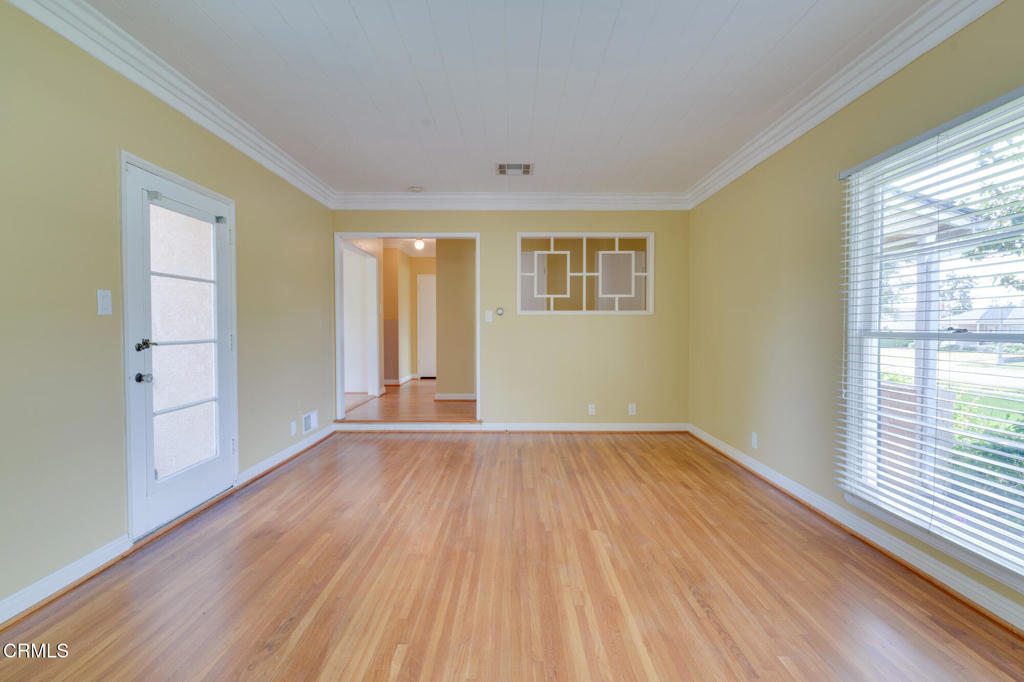 1360 Blackstone Road San Marino, CA 91108 - Photo 5 of 31 a view of an empty room with wooden floor and a window