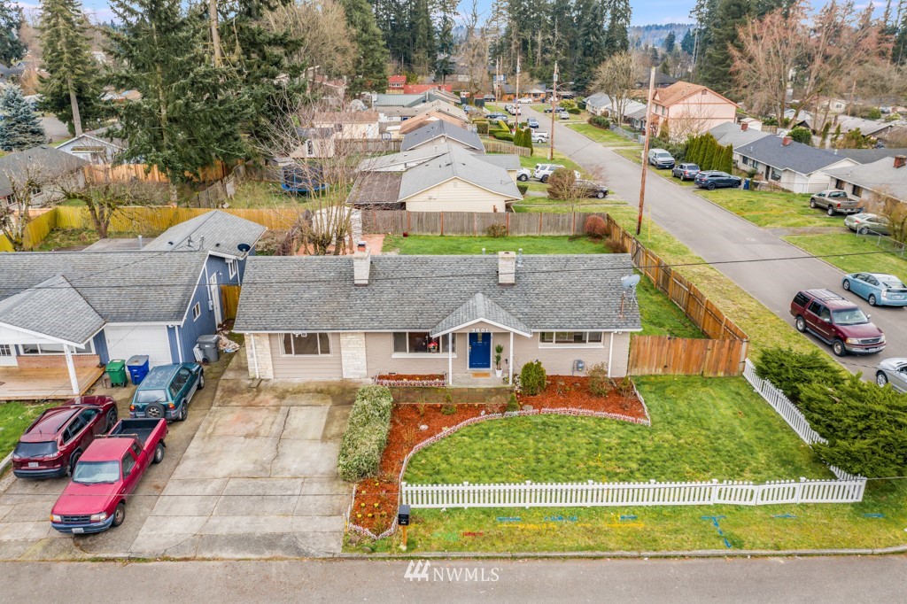 3601 Northeast 9th Street Renton, WA 98056 - Photo 4 of 23 an aerial view of residential houses with outdoor space and parking