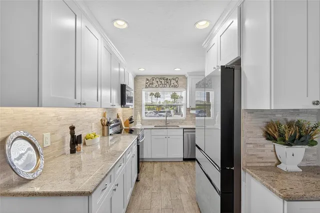 a bed room with a bed and a window