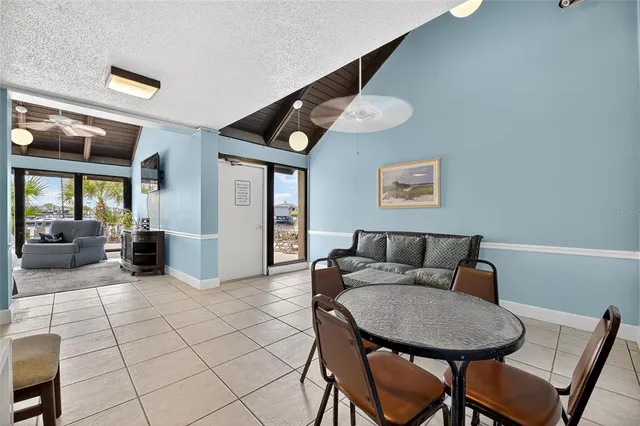 an aerial view of a house with a ocean view