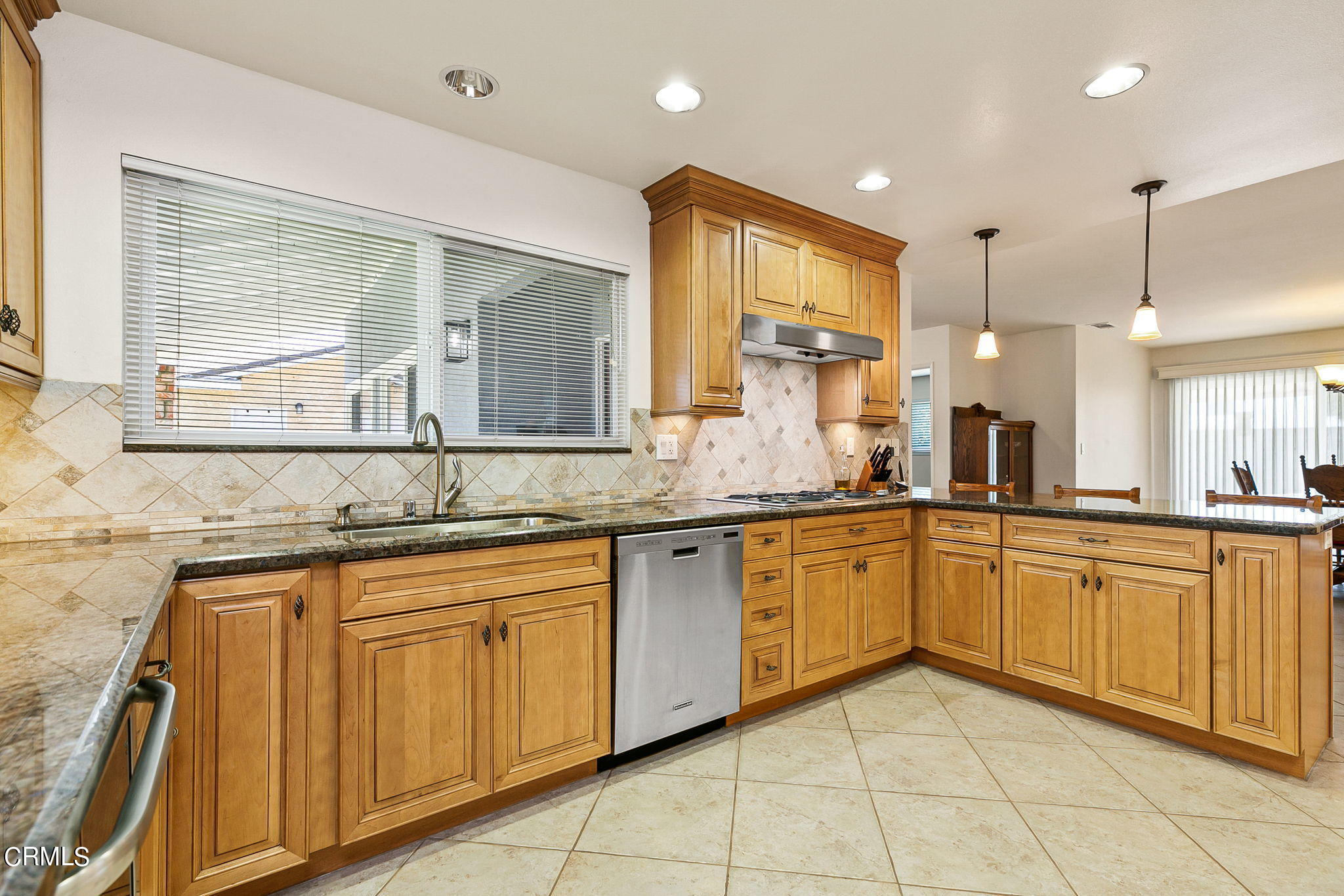 1201 Astoria Place Oxnard, CA 93030 - Photo 13 of 25 Custom cabinets with granite couonters
