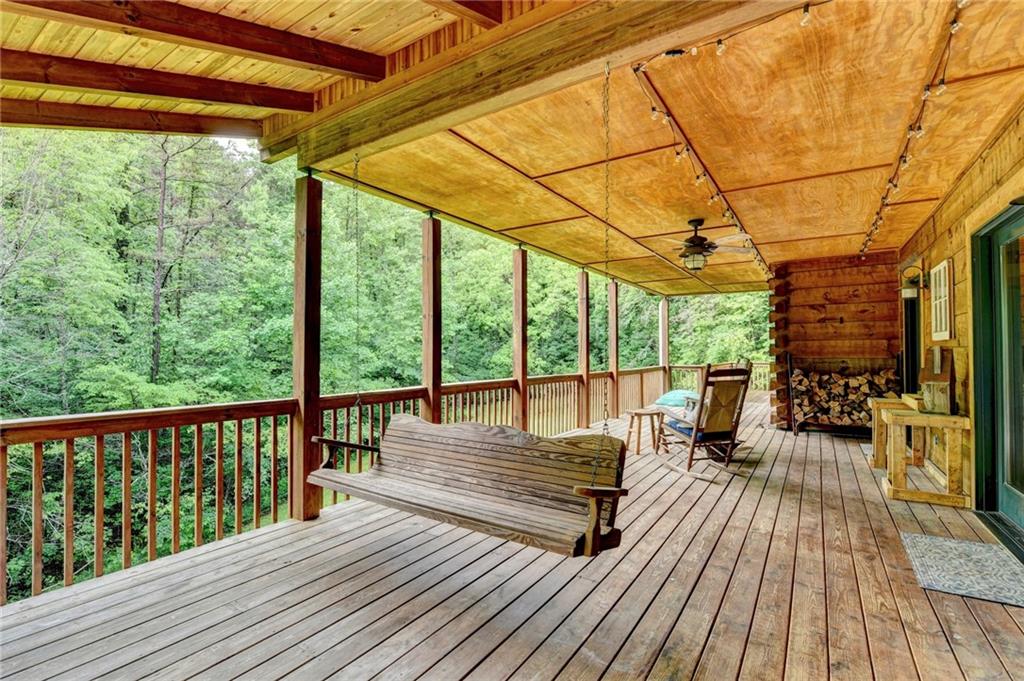 82 Walnut Grove Lane Tiger, GA 30576 - Photo 75 of 88 a view of balcony with couch and wooden floor