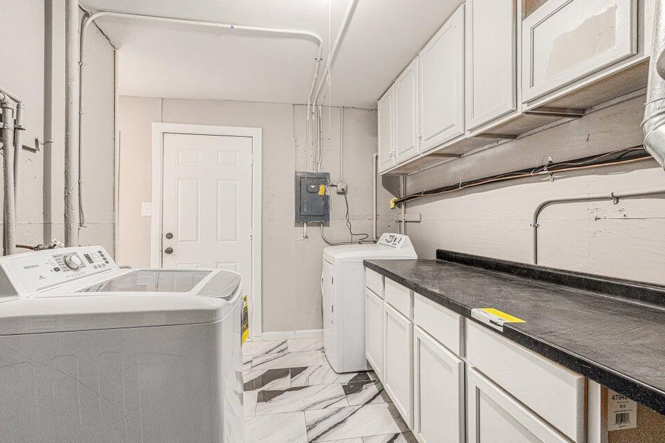 5207 West 4th Place Gary, IN 46406 - Photo 12 of 15 a view of a kitchen with a sink and cabinets