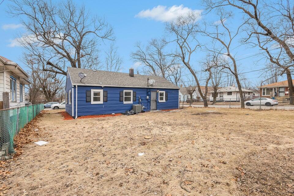 5207 West 4th Place Gary, IN 46406 - Photo 13 of 15 a front view of a house with a yard