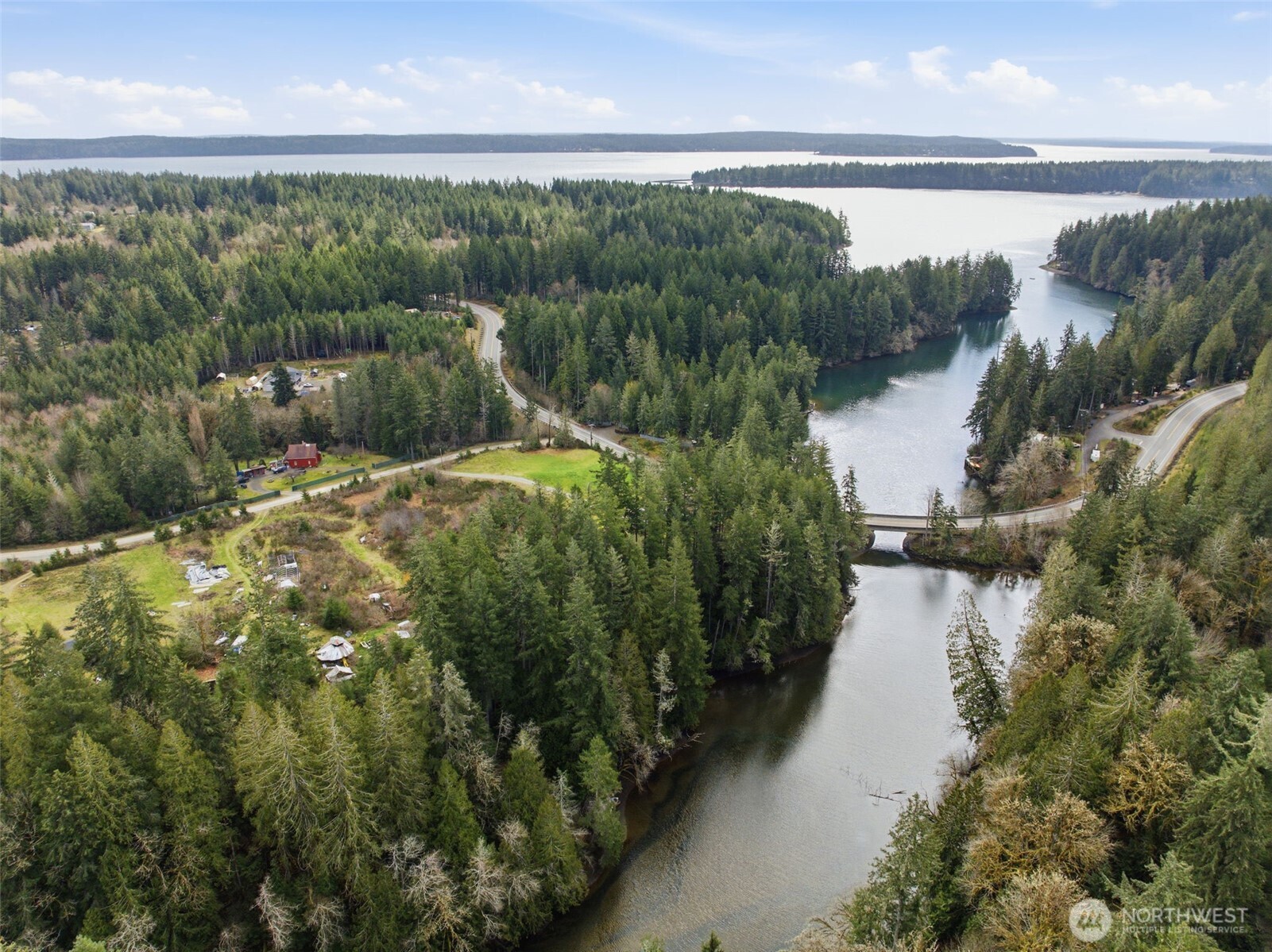 0 East McLane Cv Drive Grapeview, WA 98546 - Photo 14 of 20 a view of a lake from a yard