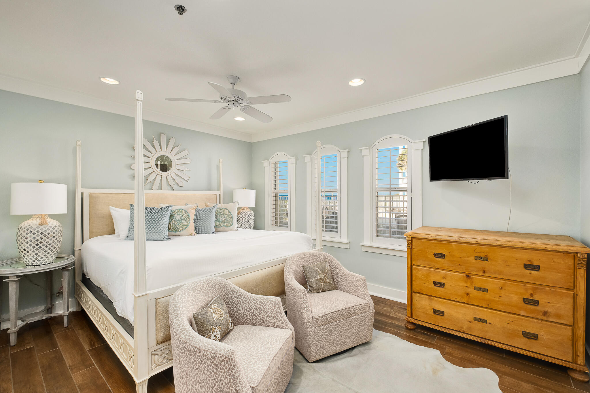 10140 East County Highway 30A, Unit A102 Inlet Beach, FL 32461 - Photo 15 of 37 a bedroom with a bed a couch and flat screen tv