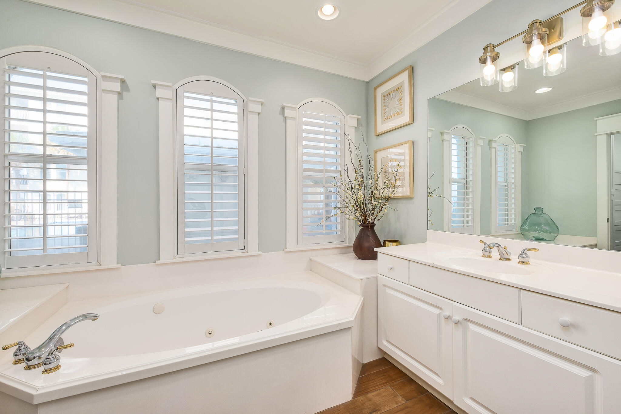 10140 East County Highway 30A, Unit A102 Inlet Beach, FL 32461 - Photo 18 of 37 a bathroom with a tub sink and mirror
