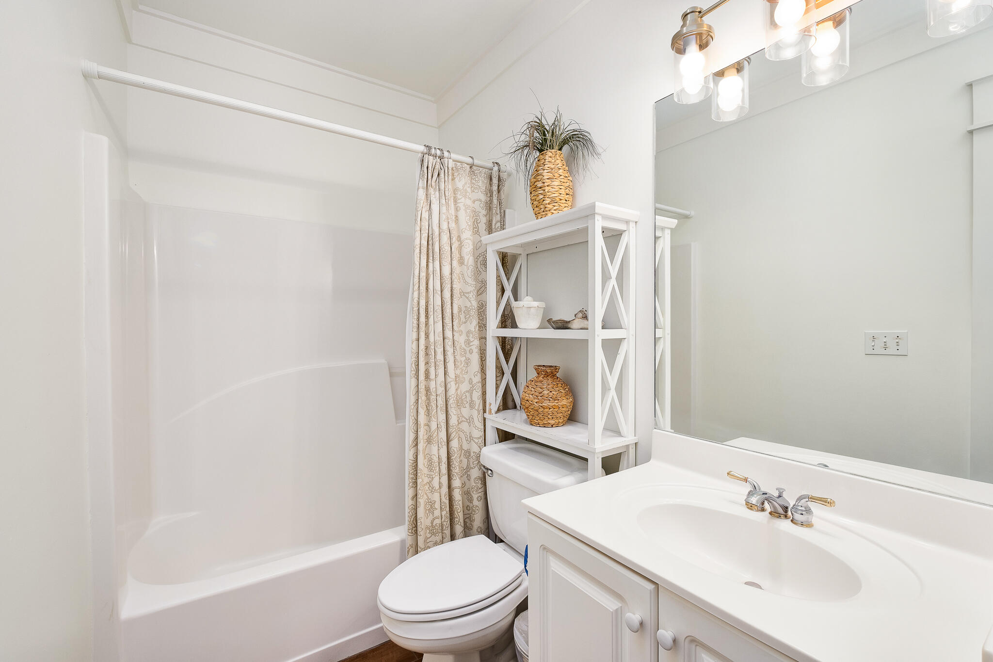 10140 East County Highway 30A, Unit A102 Inlet Beach, FL 32461 - Photo 20 of 37 a bathroom with a sink a toilet and shower