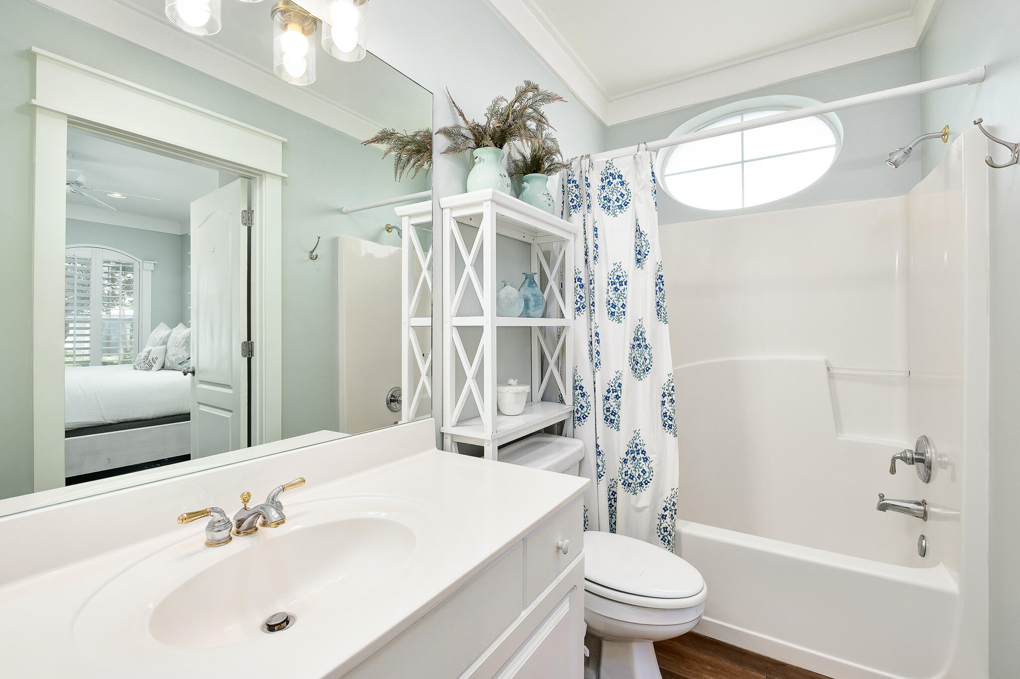 10140 East County Highway 30A, Unit A102 Inlet Beach, FL 32461 - Photo 22 of 37 a bathroom with a sink a toilet and a mirror