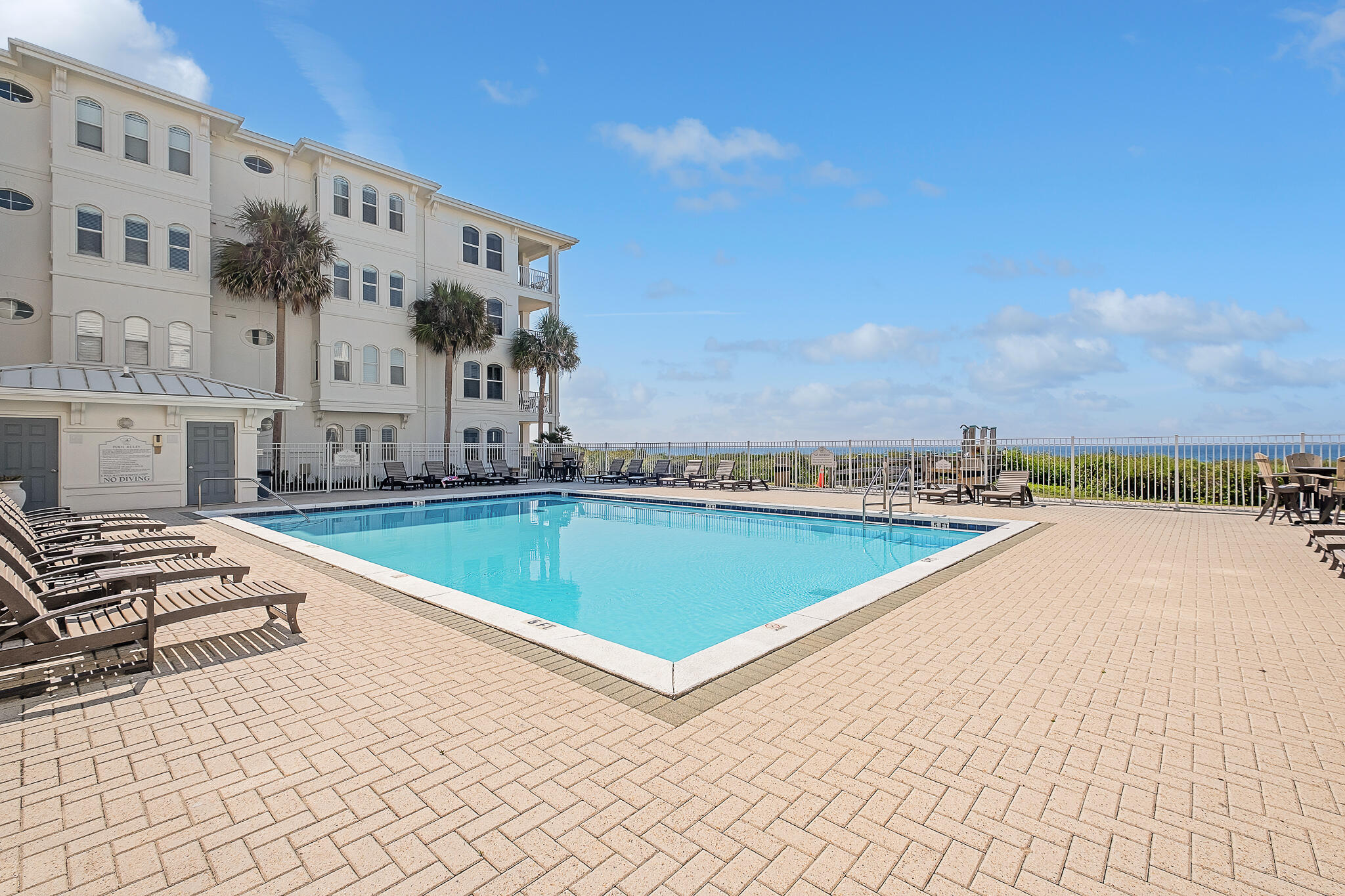 10140 East County Highway 30A, Unit A102 Inlet Beach, FL 32461 - Photo 26 of 37 a view of a swimming pool with lounge chair