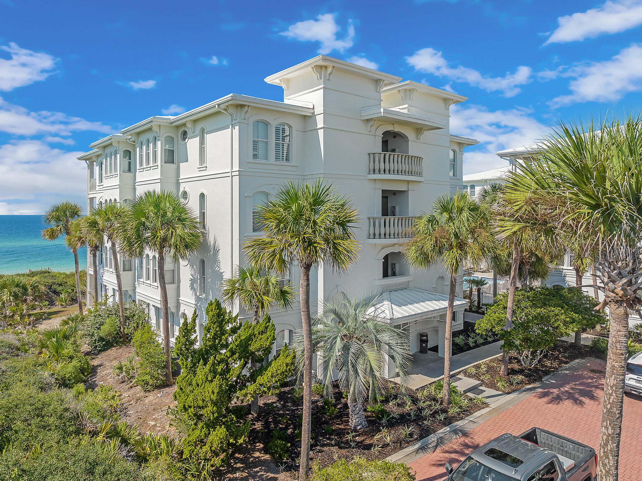 10140 East County Highway 30A, Unit A102 Inlet Beach, FL 32461 - Photo 31 of 37 a front view of a house with a yard