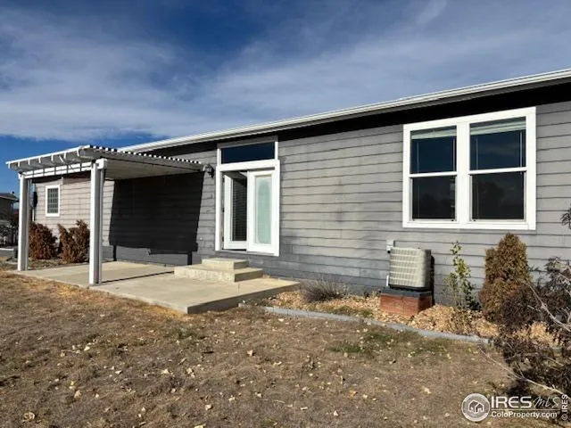 a front view of a house with a patio