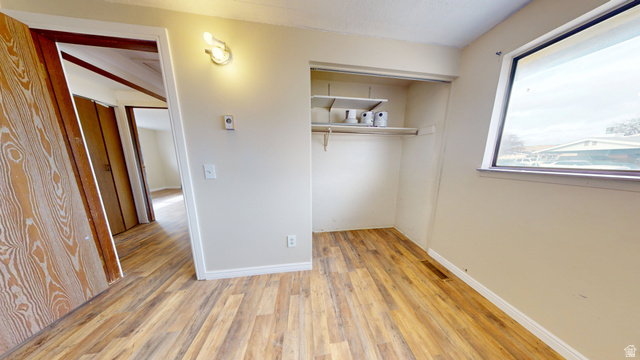 1348 Sagewood Road Price, UT 84501 - Photo 19 of 34 Empty room featuring light wood-type flooring and baseboards