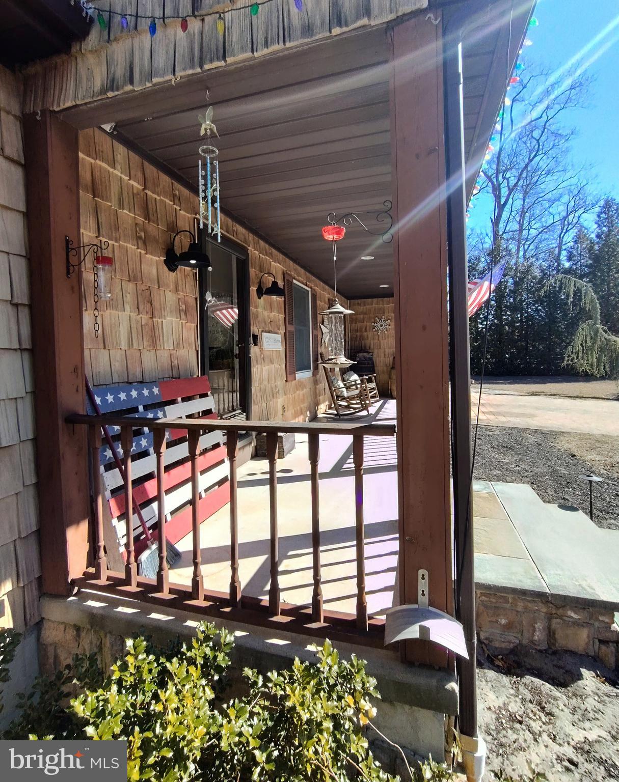 16 Old Red Lion Road Southampton, NJ 08088 - Photo 6 of 56 a view of a porch with a bench