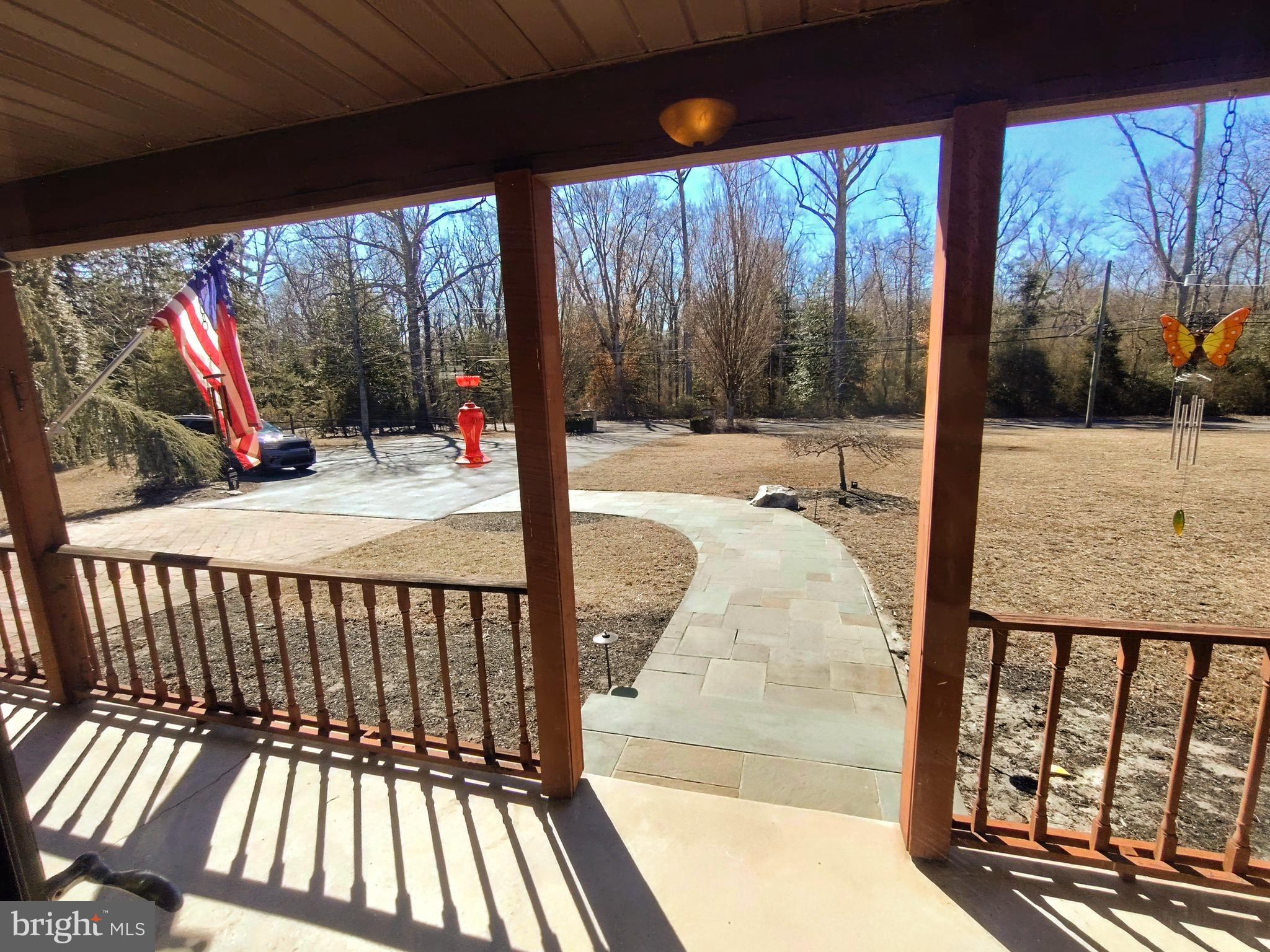 16 Old Red Lion Road Southampton, NJ 08088 - Photo 9 of 56 a view of backyard with large trees and wooden fence
