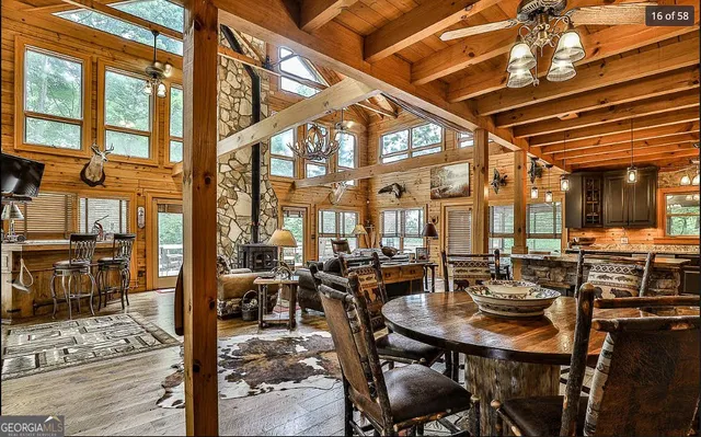 a bed sitting in a spacious bedroom next to a window