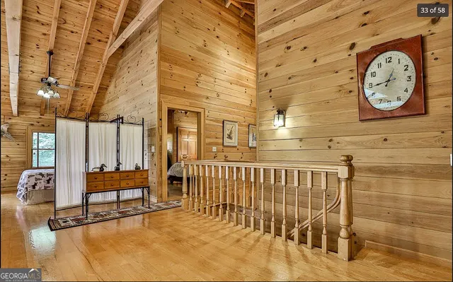 a view of backyard with a large tree