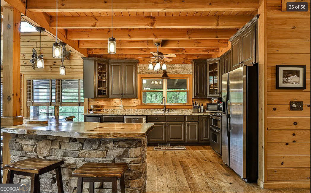 1427 Cherry Lake Drive Blue Ridge, GA 30513 - Photo 22 of 89 a dinning table and chairs in the patio