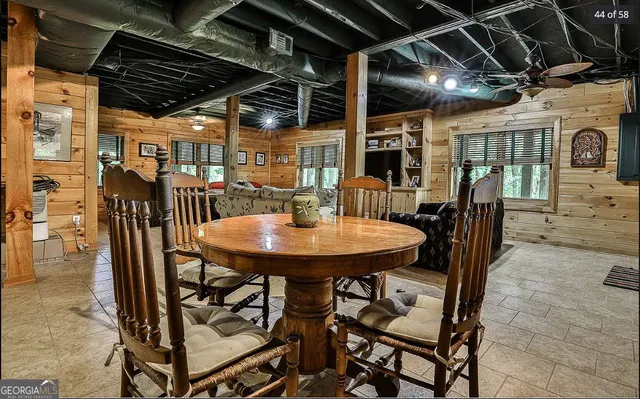 a view of a porch with wooden floor