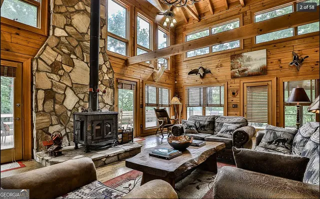 a room with lots of furniture and rug