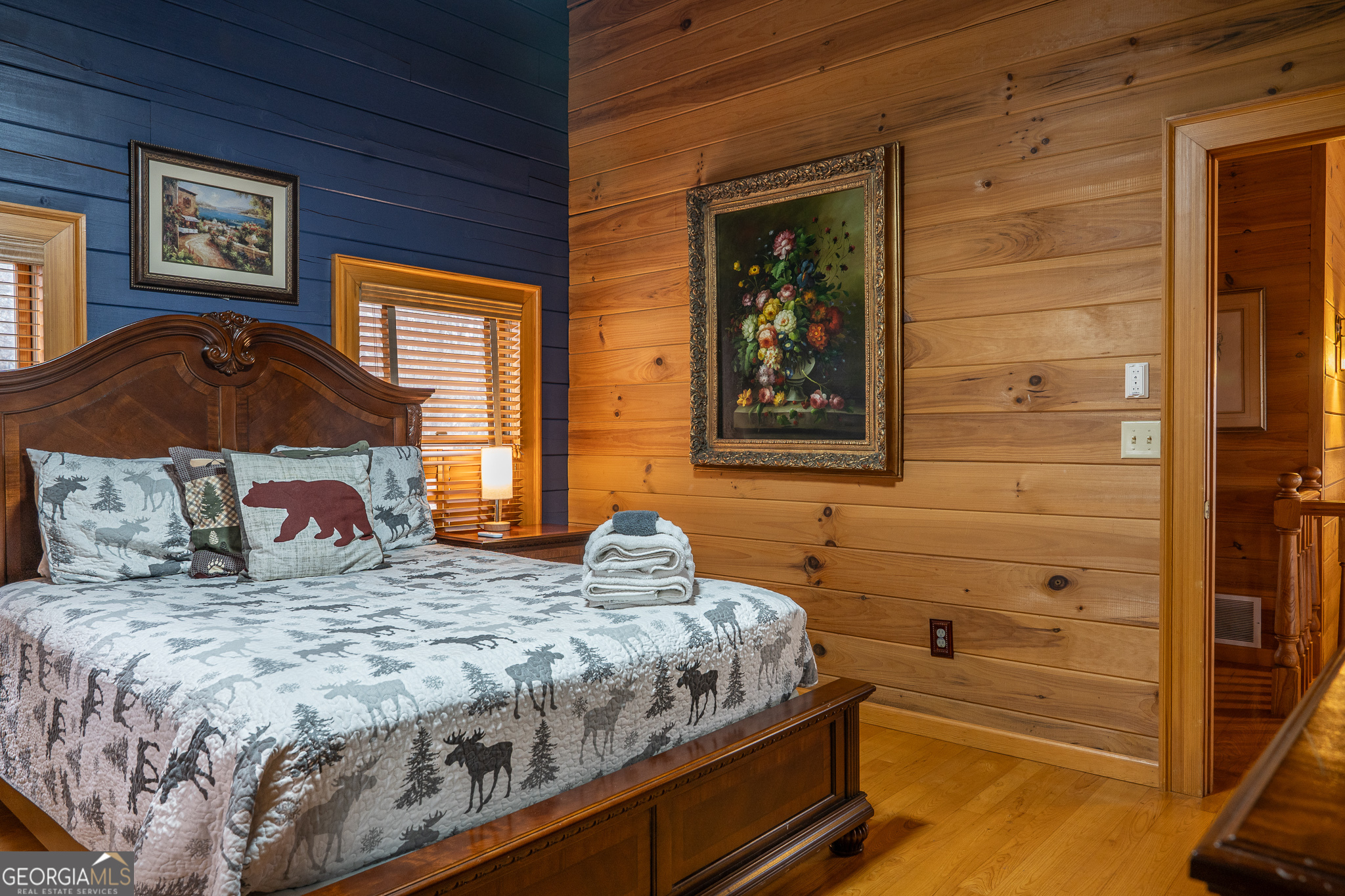 1427 Cherry Lake Drive Blue Ridge, GA 30513 - Photo 32 of 89 a bedroom with a bed and a window