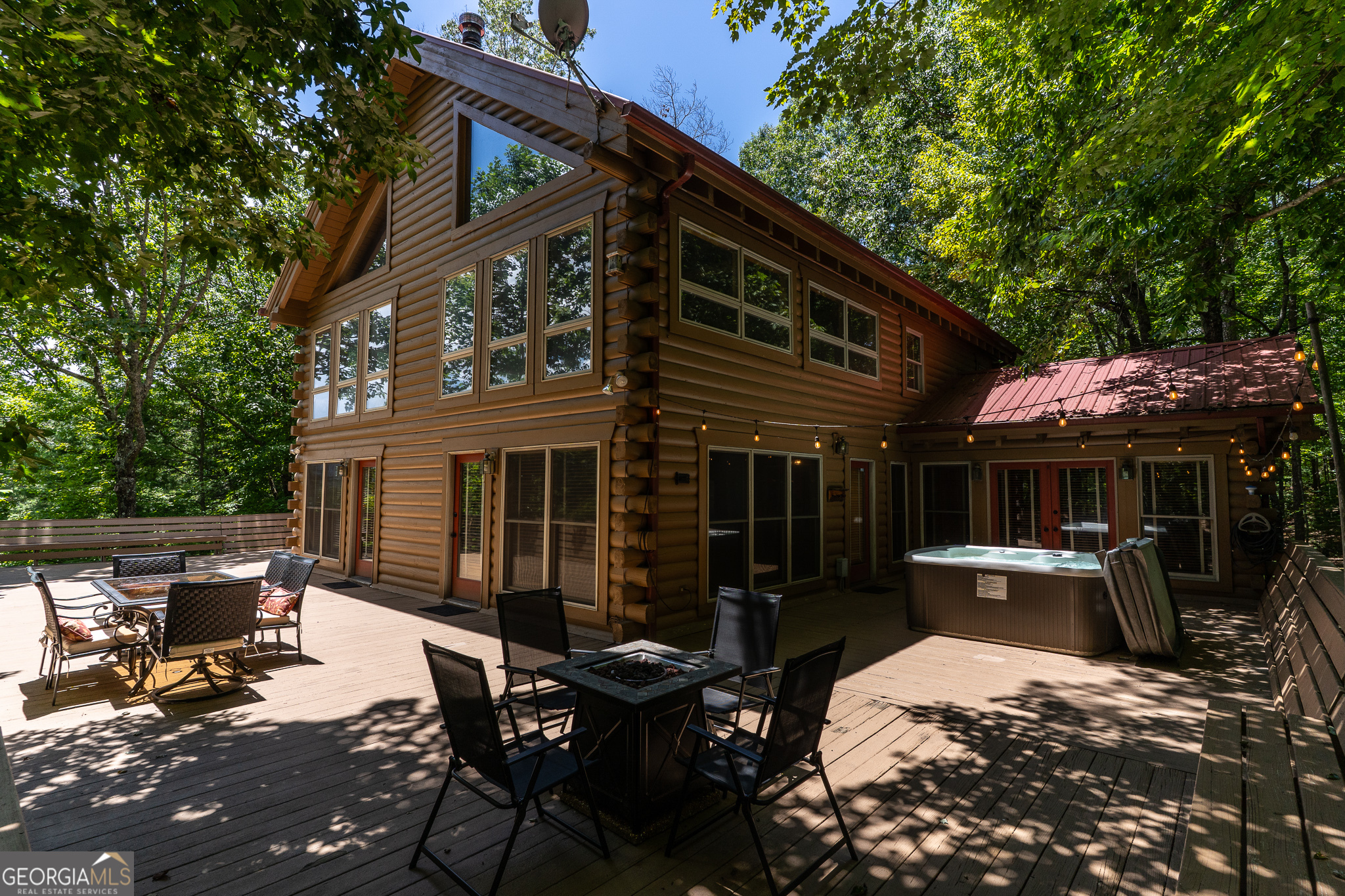 1427 Cherry Lake Drive Blue Ridge, GA 30513 - Photo 54 of 89 a view of backyard with outdoor seating and plants